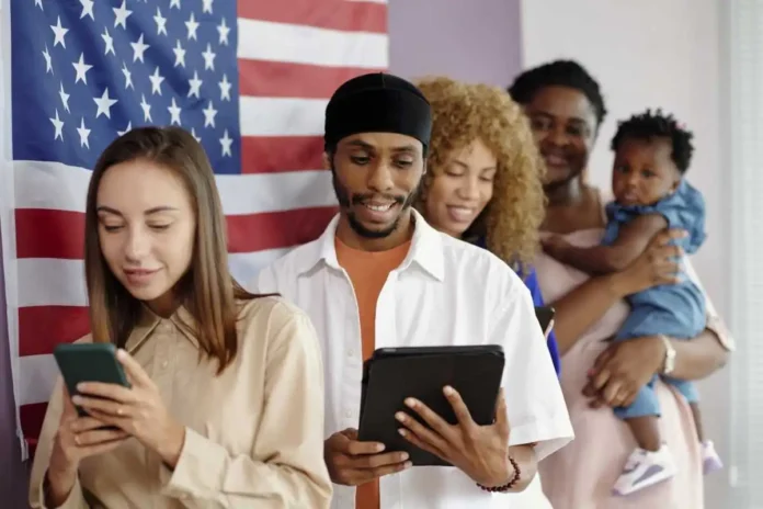 a group of people standing in front of a flag